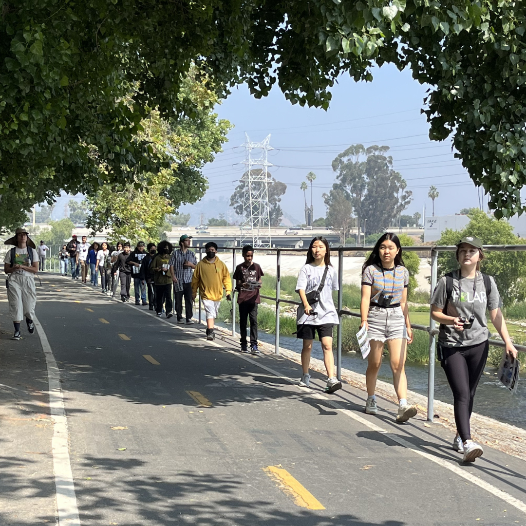 Students walk along the LA River trail.