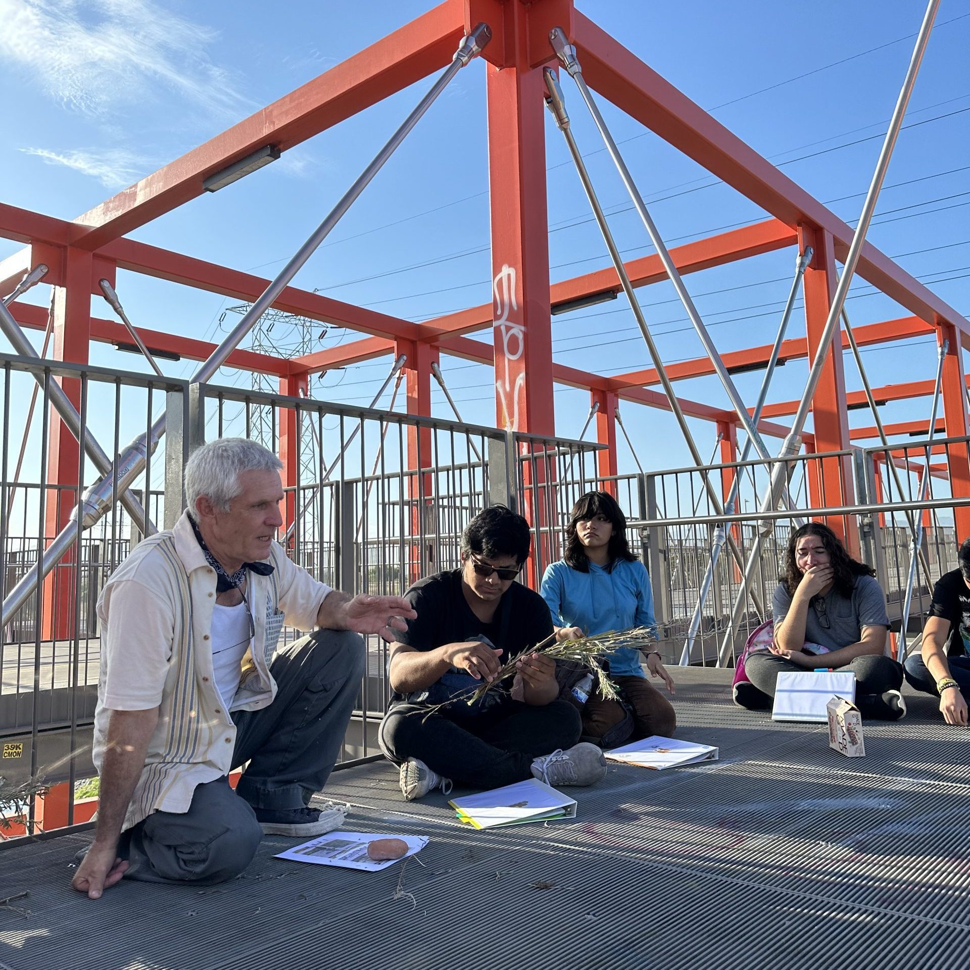 LA River Fellows sit outside.