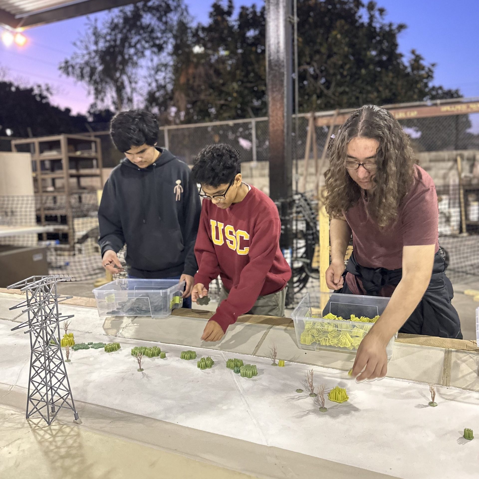 LA River Fellows for on a model of the LA River.