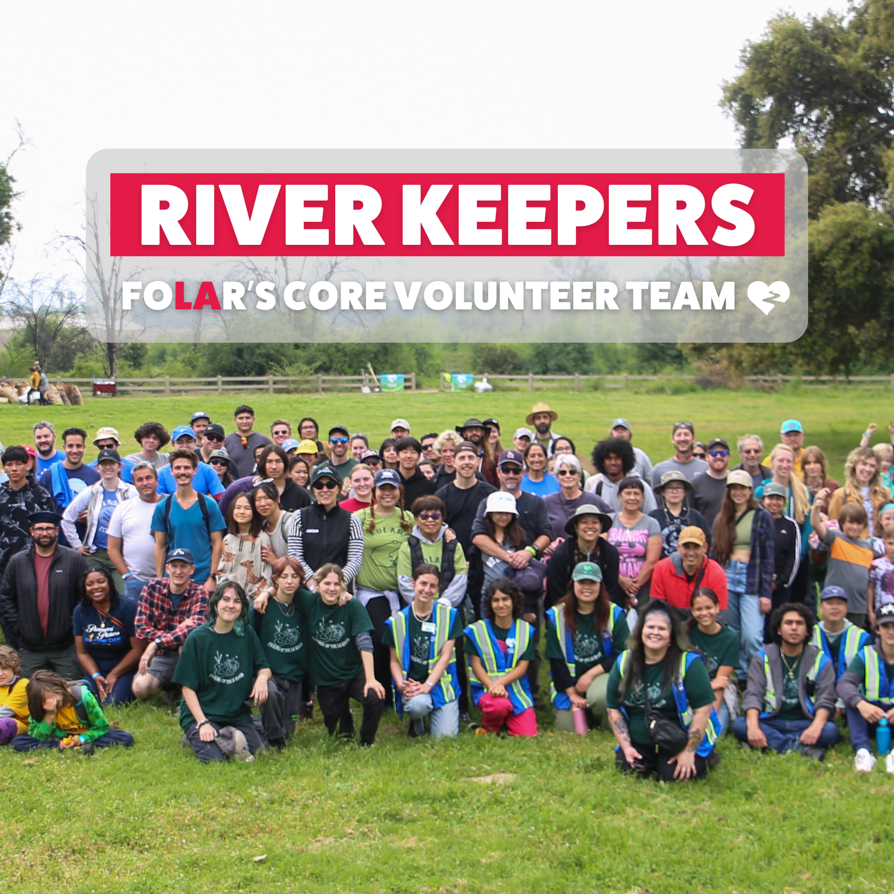 A large group of volunteers pose for a photo at the Sepulveda Basin Wildlife Reserve.